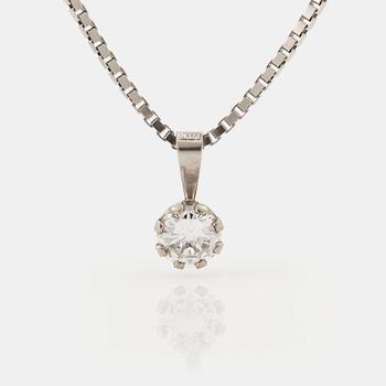 874. A brilliant cut diamond pendant.