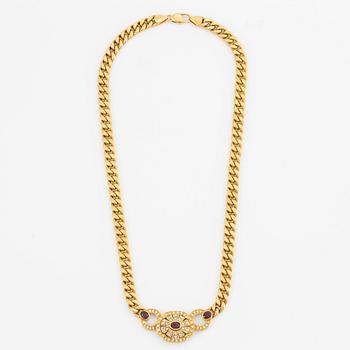 Necklace in 14K gold with faceted rubies and eight-cut diamonds.