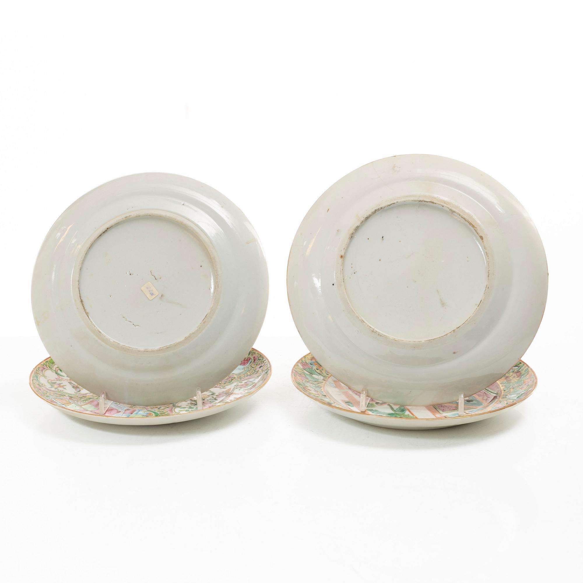 A matched set of 14 famille rose 'Canton' dinner plates, Qing dynasty, 19th century.