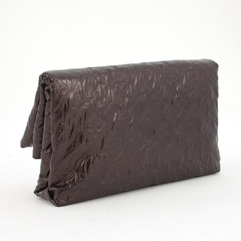 LOUIS VUITTON, a maroon jacquard textile coated with laminated film clutch, "Limelight".