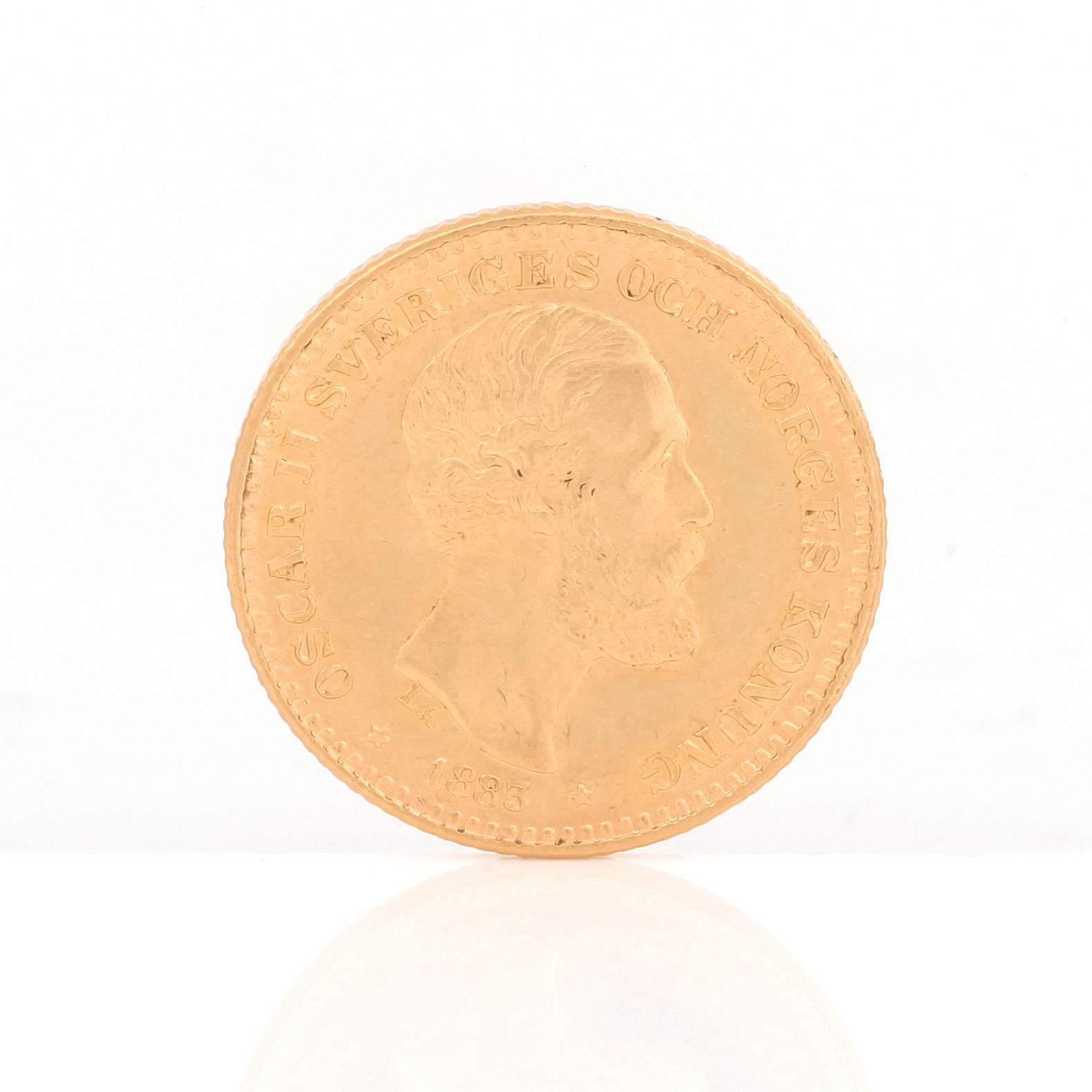 GULDMYNT, 10 kronor, Oscar II av Sverige och Norge 1883. Vikt ca 4,5 gram.