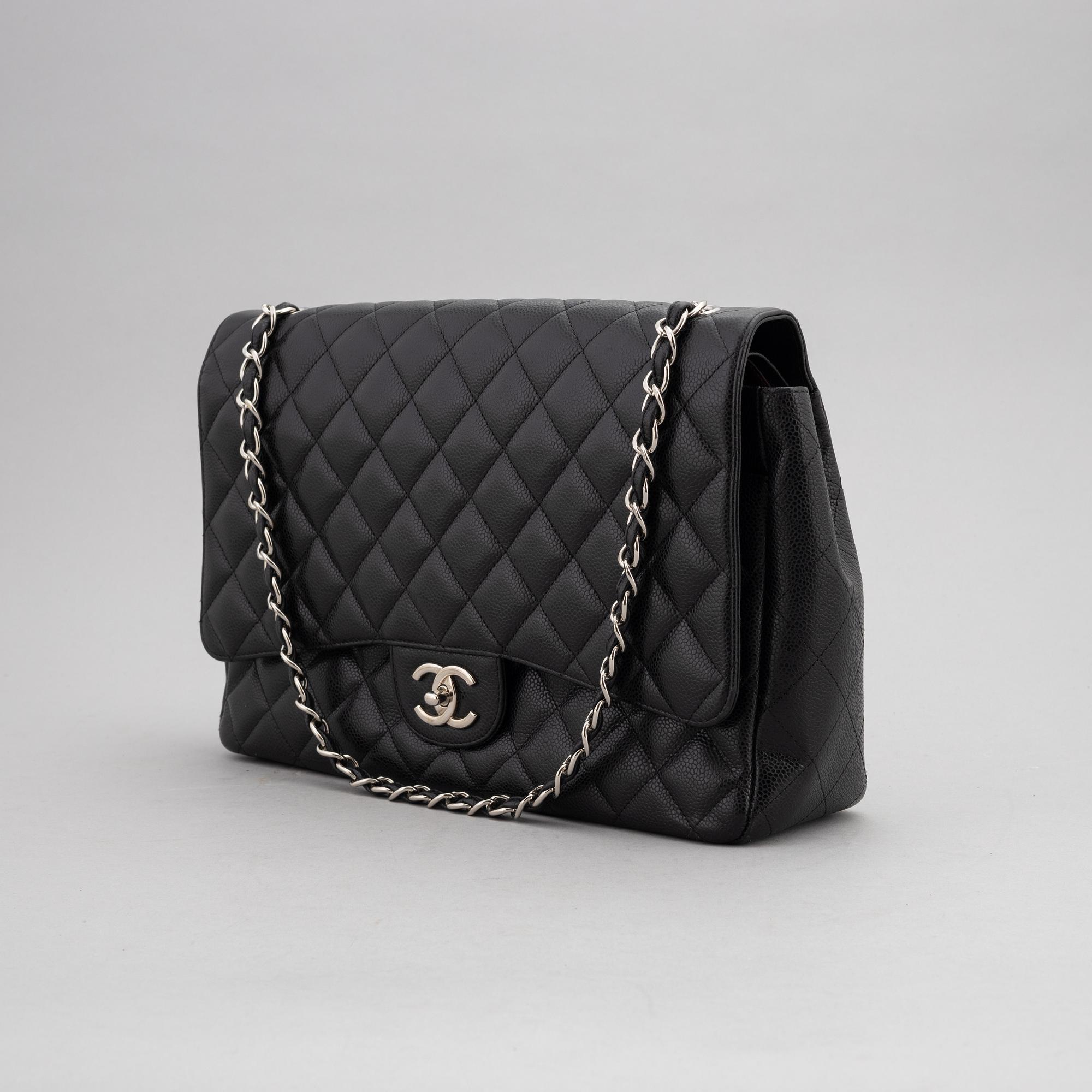Chanel, a black caviar leather 'Double Flap Bag Jumbo', 2011.