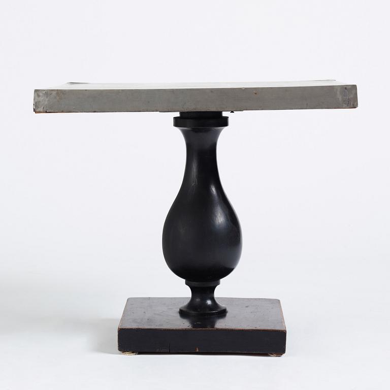 Uno Åhrén, a black lacquered table with a pewter top by Nils Fougstedt, Svenskt Tenn ca 1930. Alva & Gunnar Myrdal Collection.