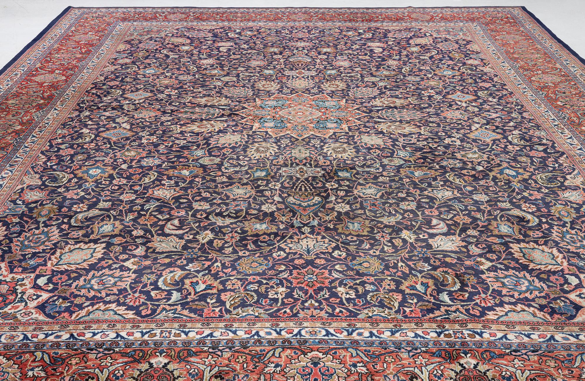 A Persian carpet, c. 445 x 320 cm.