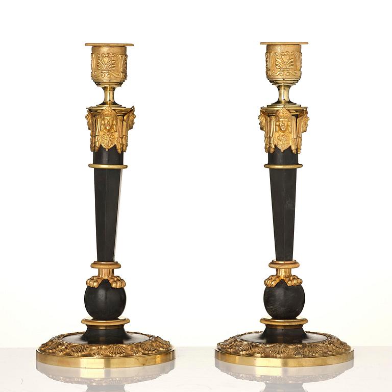 A pair of Empire presumably Russian, Moscow candlesticks from around 1820.