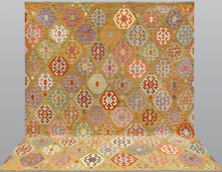 A Kilim carpet, approx. 300 x 259 cm.