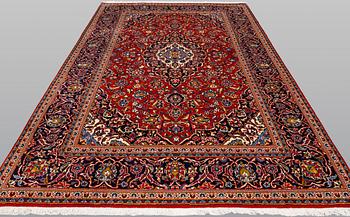 A Keshan carpet, approx. 318 x 202 cm.