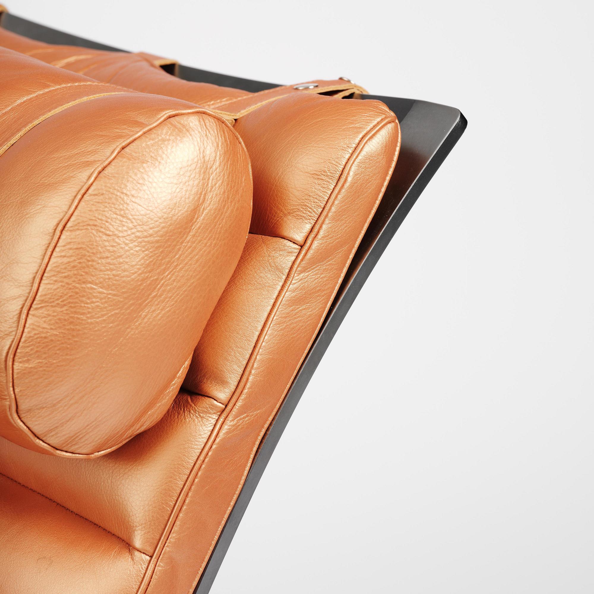 Arne Norell, an "Ari" easy chair with ottoman, Norell Möbel, Aneby, ca 2020.