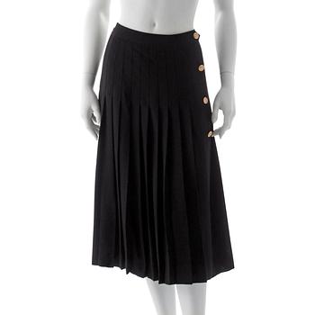 399. CÉLINE, a black pleated wool skirt.