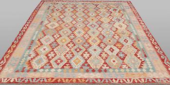 A Kilim carpet, approx. 345 x 272 cm.