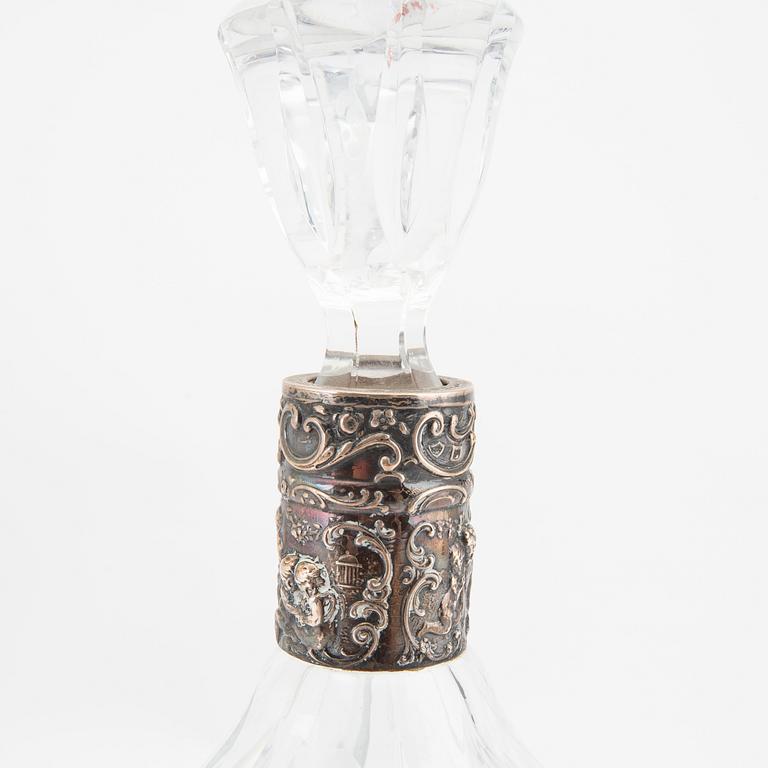A decanter with silver fitting and a free mason late 19th century glass.
