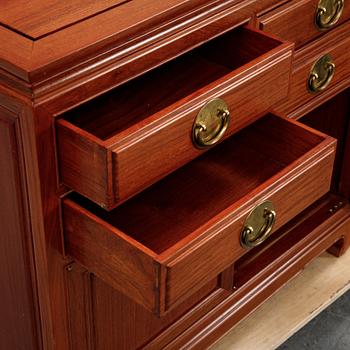 A pair of cupboards or sideboards, Yuen Cheong Furniture Co, Hong Kong, second half of the 20th century.