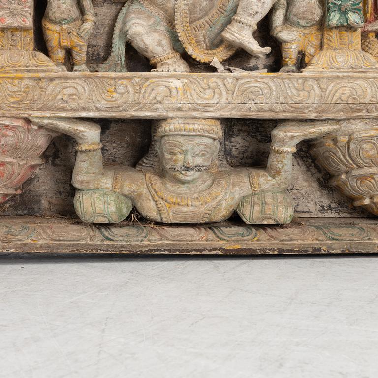 A sculptured wooden panel, India,  circa 1900.
