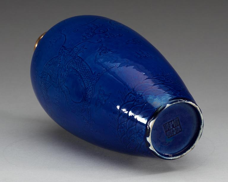 A blue glazed vase, Qing dynasty with Qianlong seal mark.