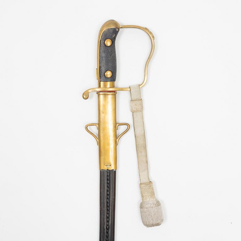 A Swedish police sabre with scabbard, drom around the year 1900.