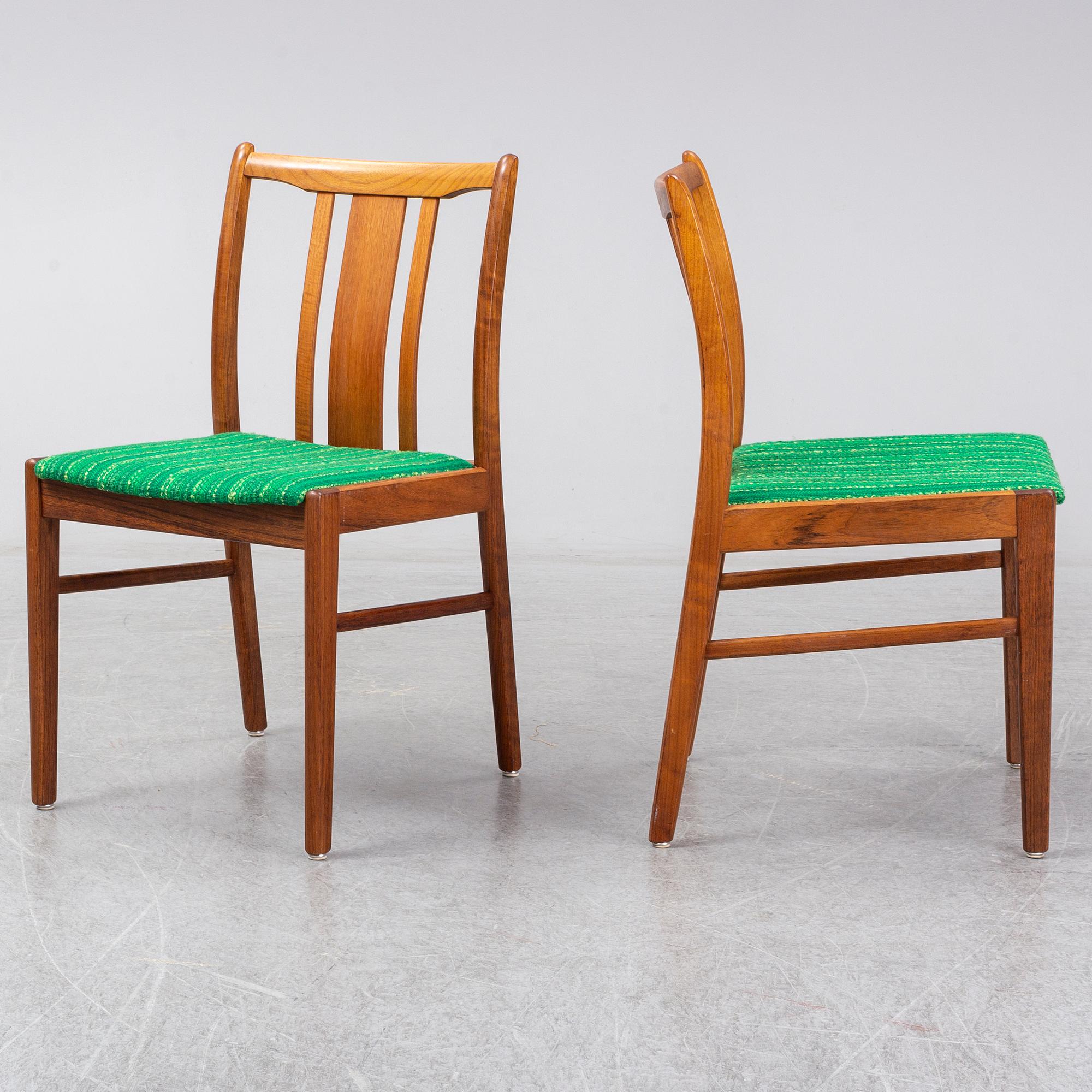 Four second half of the 20th century teak chairs.