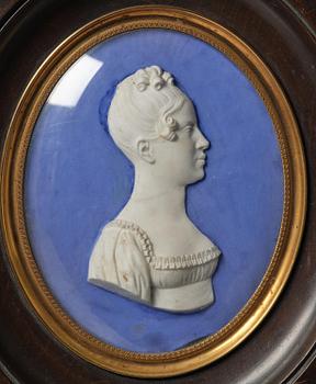A pair of Sèvres biscuit plaques by Alexandre Brachard (1775-1843), dated 1812.
