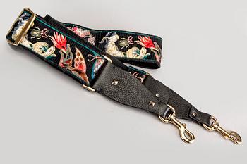 A Valentino strap.