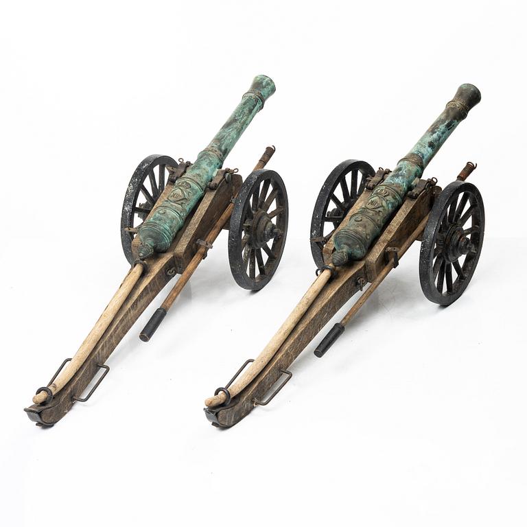 Modellkanoner ett par, 1900-tal.