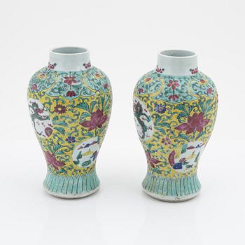 A pair of famille rose vases, China, early 20th Century.