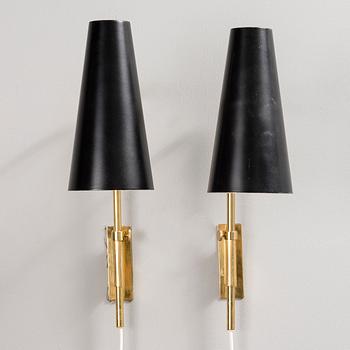 PAAVO TYNELL, A PAIR OF WALL LIGHTS. Manufacturer's stamp Taito. 1950s.