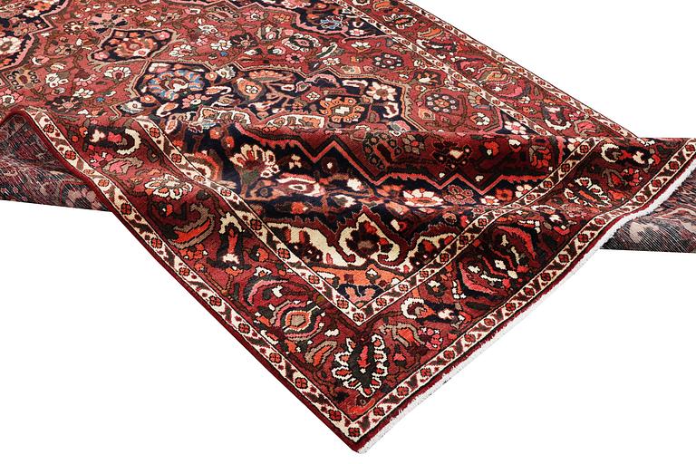 A Bakhtiari carpet, c. 306 x 200 cm.