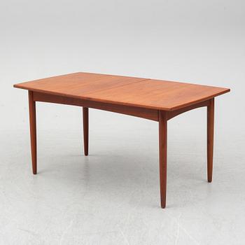 A British teak veneered dining table, 1960's.