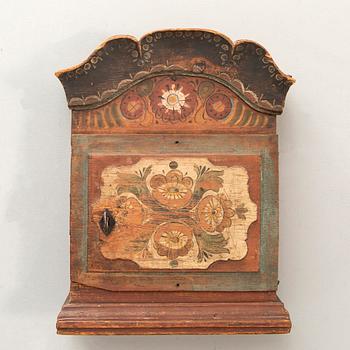 A Swedish painted wall cabinet by Mill Olof Olsson, Lima 19th century.