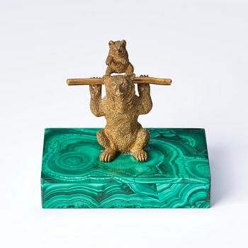 A Russian Nicholas II malachite-veneered and gilt-bronze paperweight, late 19th century.