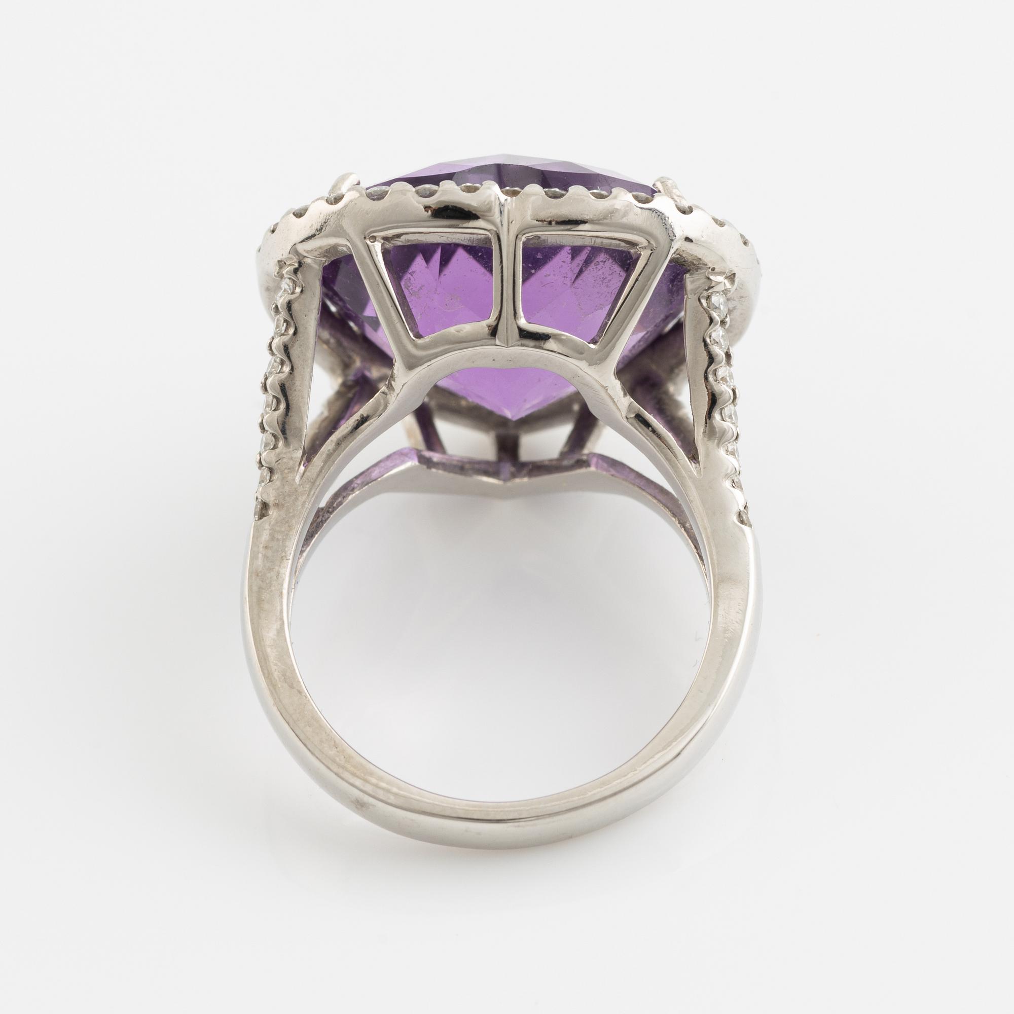 Heart shaped amethyst and brilliant cut diamond ring.