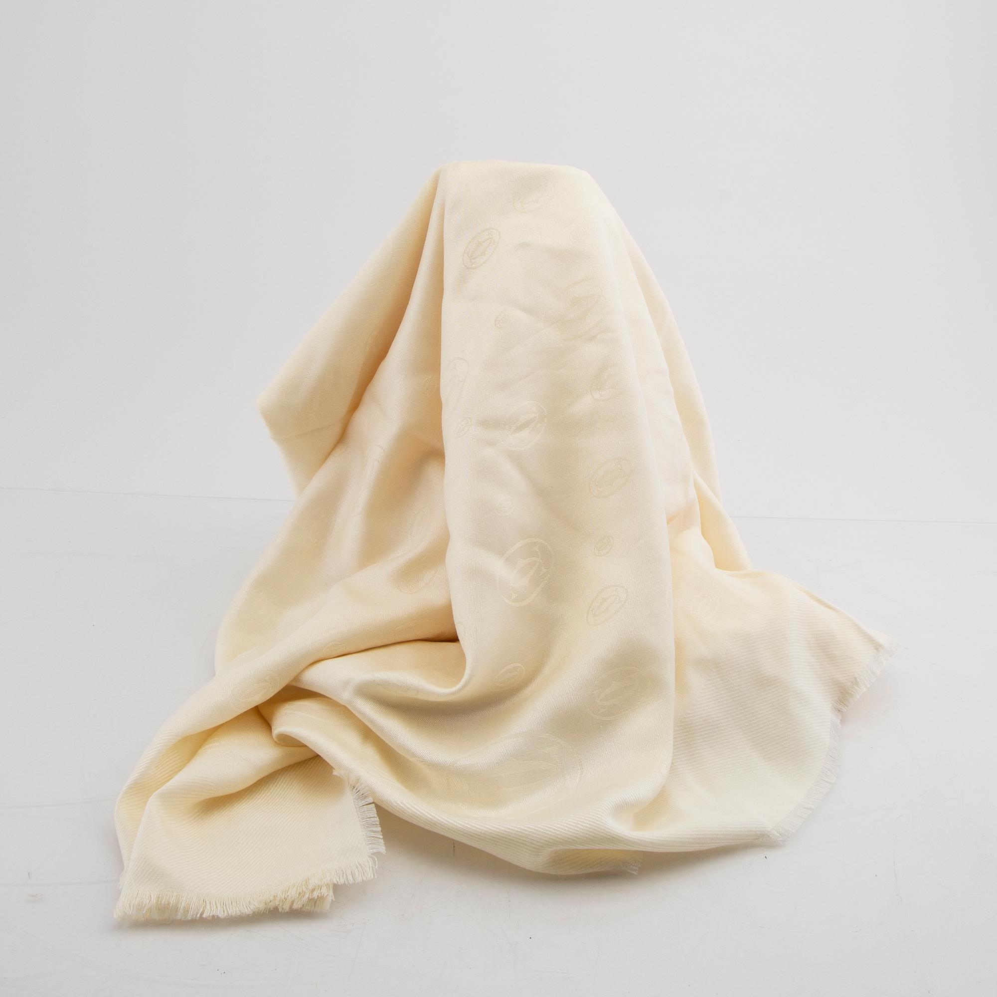 Cartier, a wool/silk scarf.