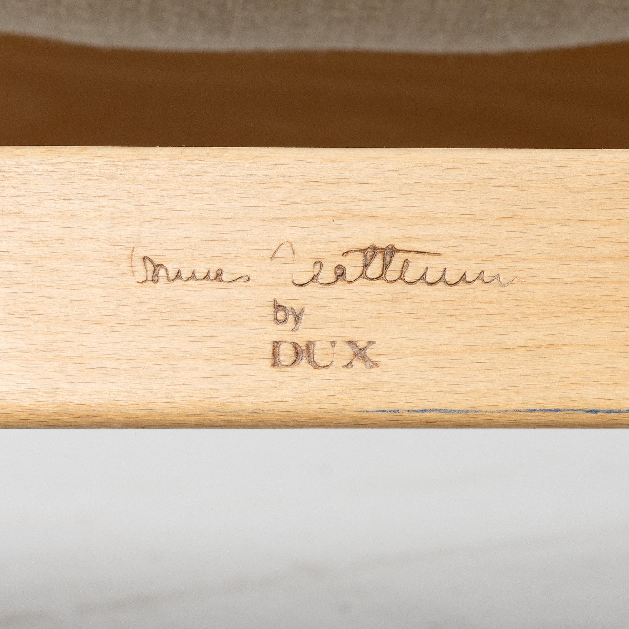 Bruno Mathsson, a pair of 'Pernilla' armchairs, Dux, Sweden, later part of the 20th century.