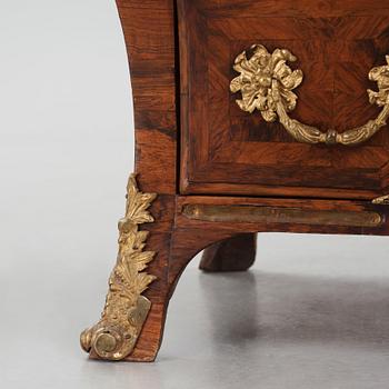 A Swedish early rococo parquetry, ormolu-mounted and marble commode, presumably by S. Pasch or J. Wulf , ca. 1740.