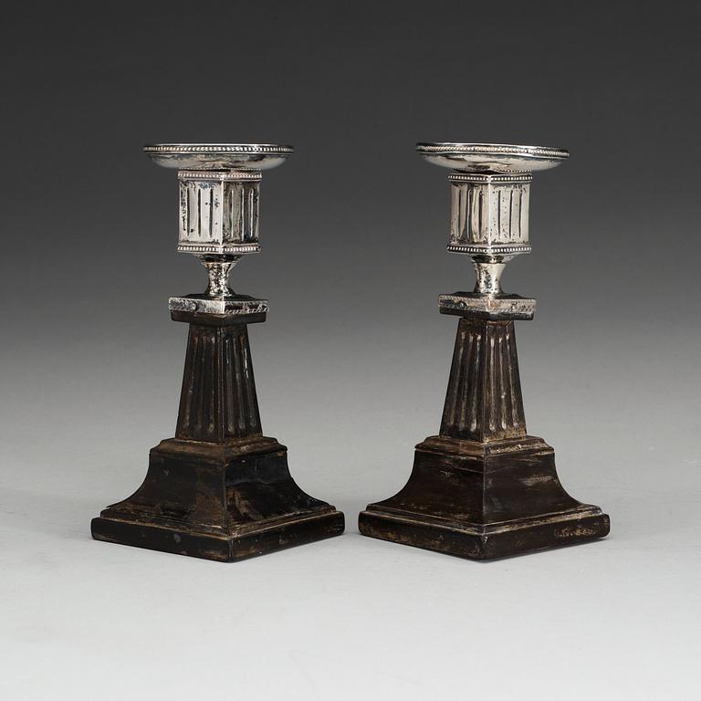 A pair of Swedish early 19th century silver and wood candlesticks, marks of Lorenz Georg Weis, Norrköping (1791-1829).