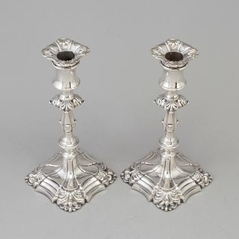 A pair of English silver candlesticks by Henry Wilkinson, London 1895.