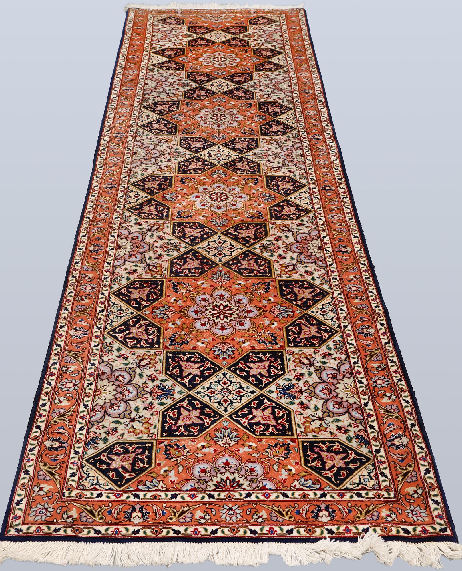 A part silk Tabriz runner, so called 50 Raj, approx. 300 x 77 cm.