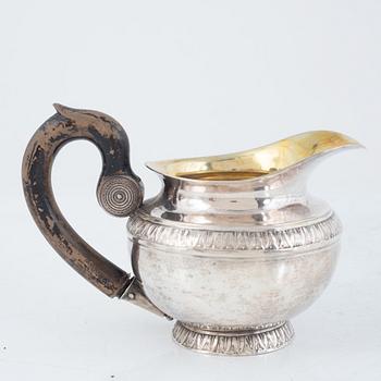 A Polish Silver Teapot and Creamer, Warsaw, 19th Century.