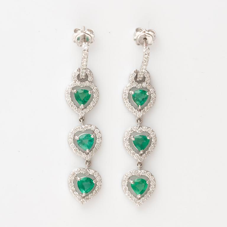 Emerald and brilliant cut diamond earrings.