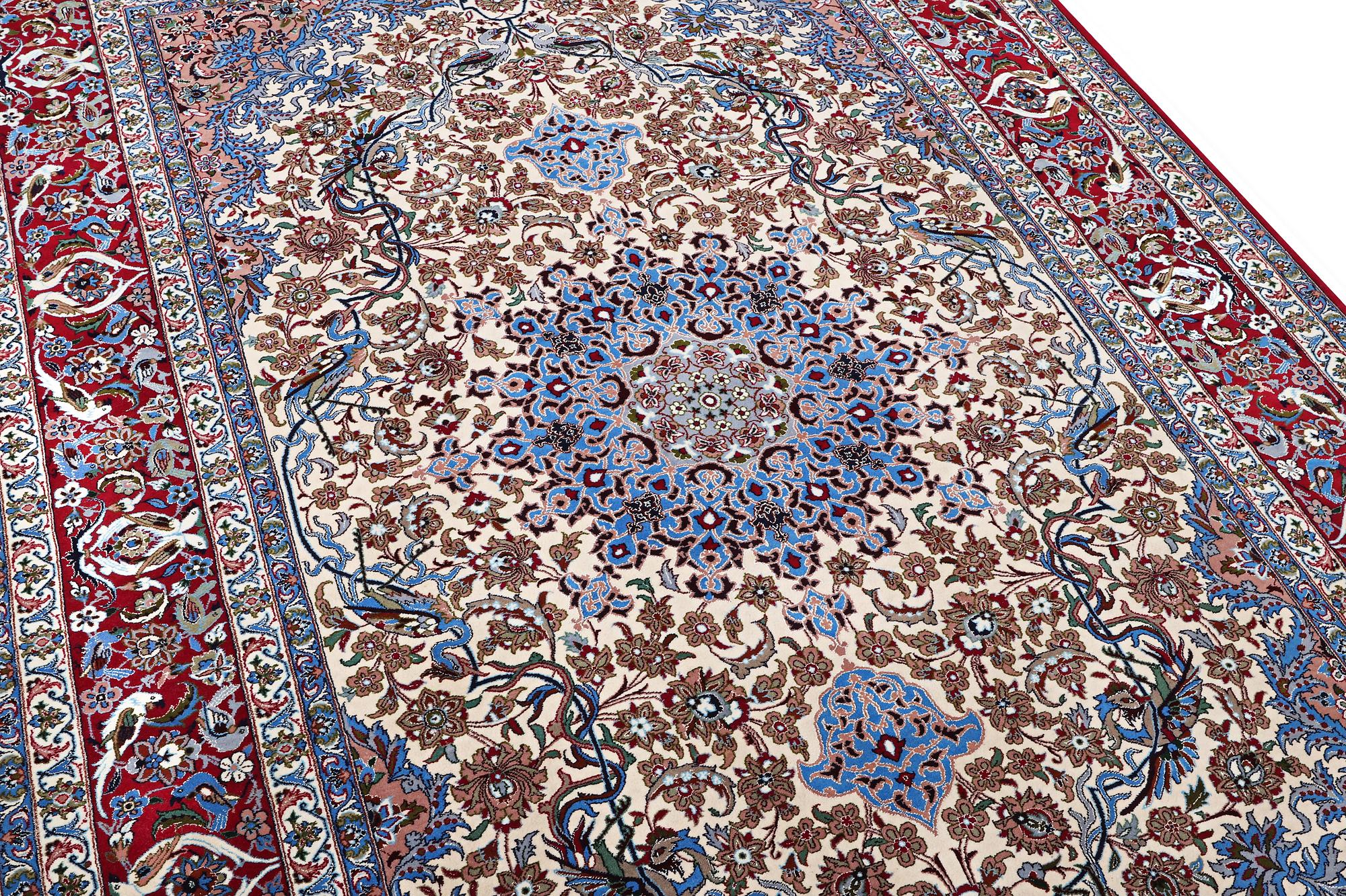 An Esfahan rug, part silk, figural, c. 243 x 158 cm.