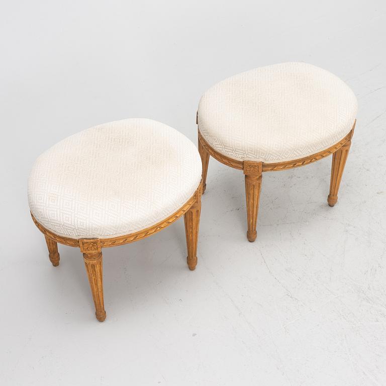 A pair of Louis XVI-style stools, late 19th century.
