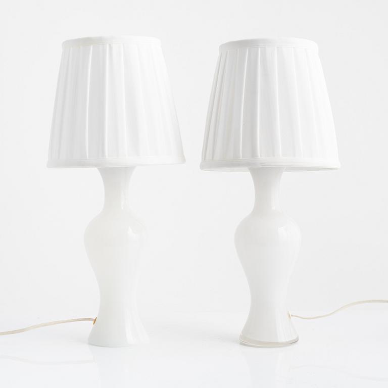 A pair of similar glass table lights from Lindshammars glasbruk, probably designed by Gunnar Ander.