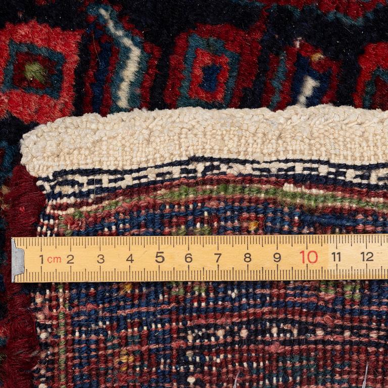 A semi-antique Bidjar carpet, c. 310 x 145 cm.