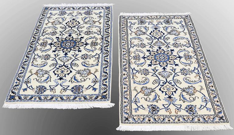 Two Nain rugs, ca 138 x 70 and 140 x 70 cm.