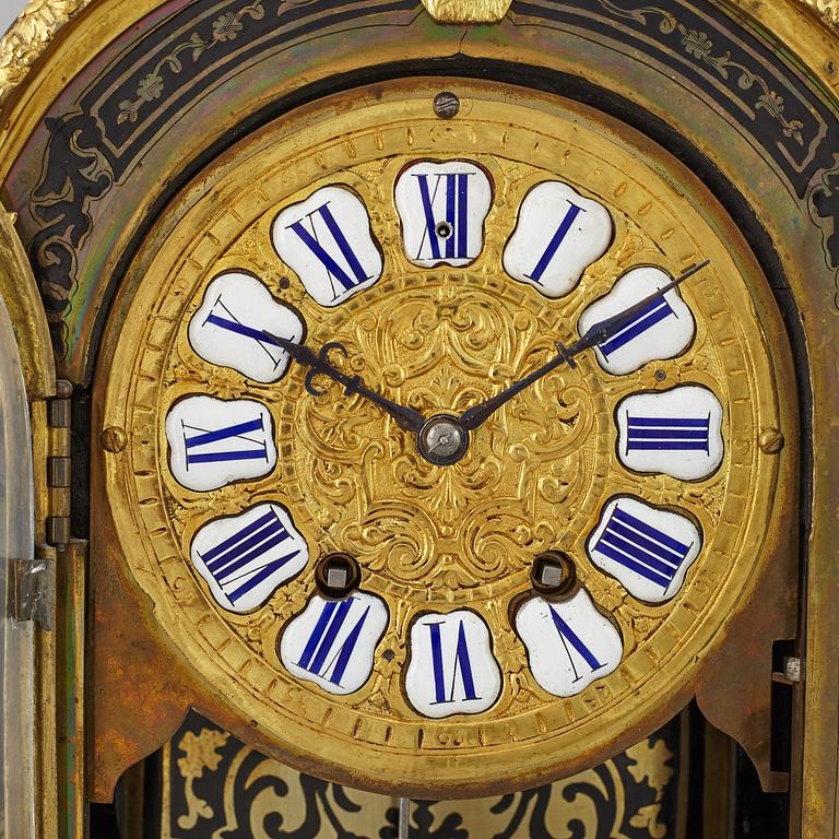 A boulle style table clock, circa 1900.