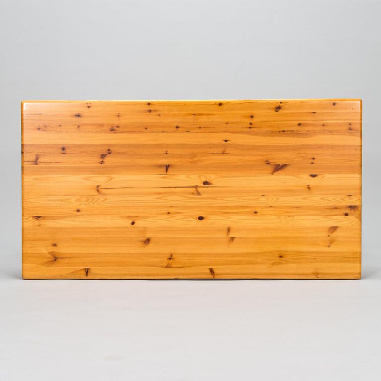 A pine wood and rattan table, late 20th century.
