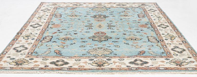 An Agra carpet, c. 302 x 239 cm.