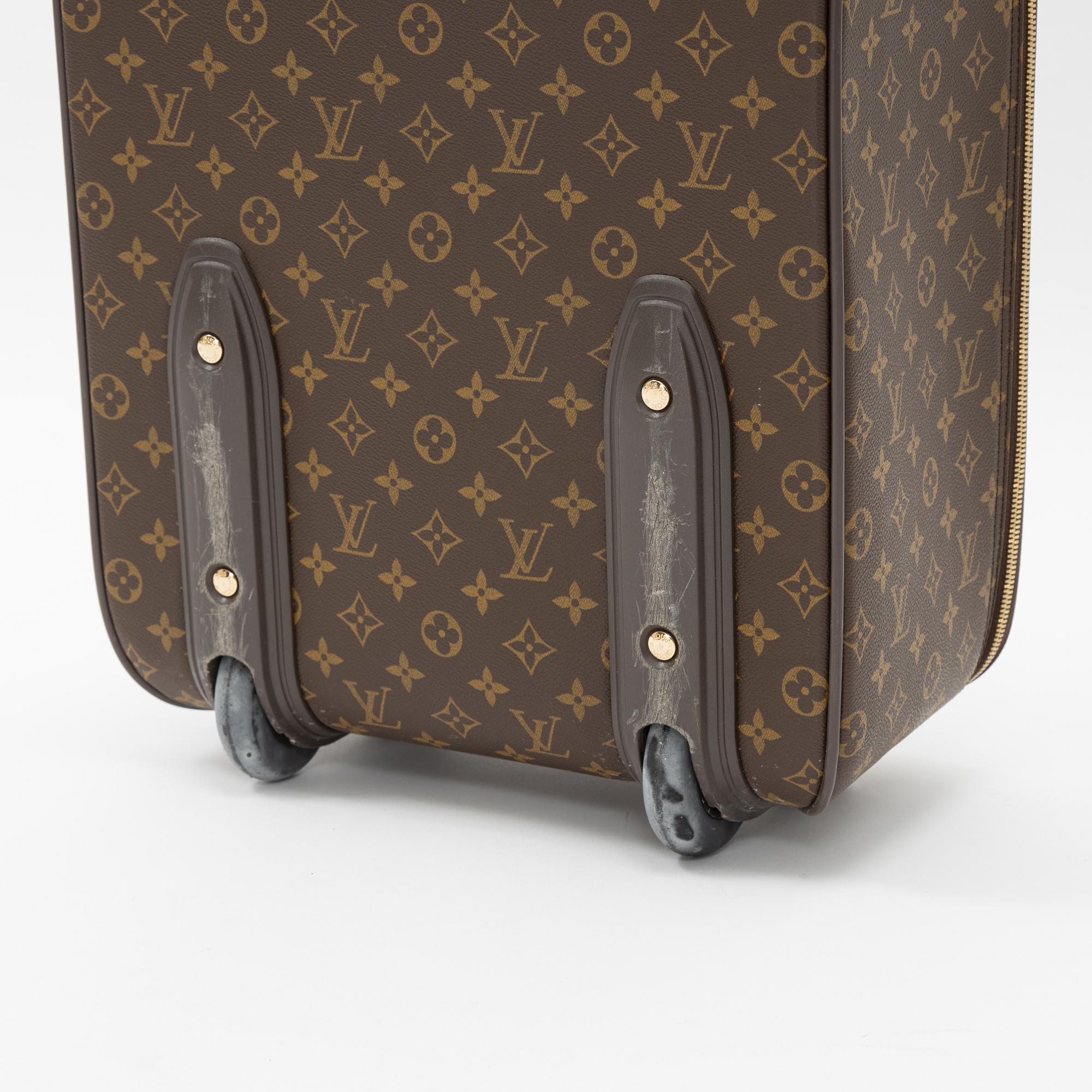 Louis Vuitton, a monogram canvas 'Pégase 50' suitcase, 203.