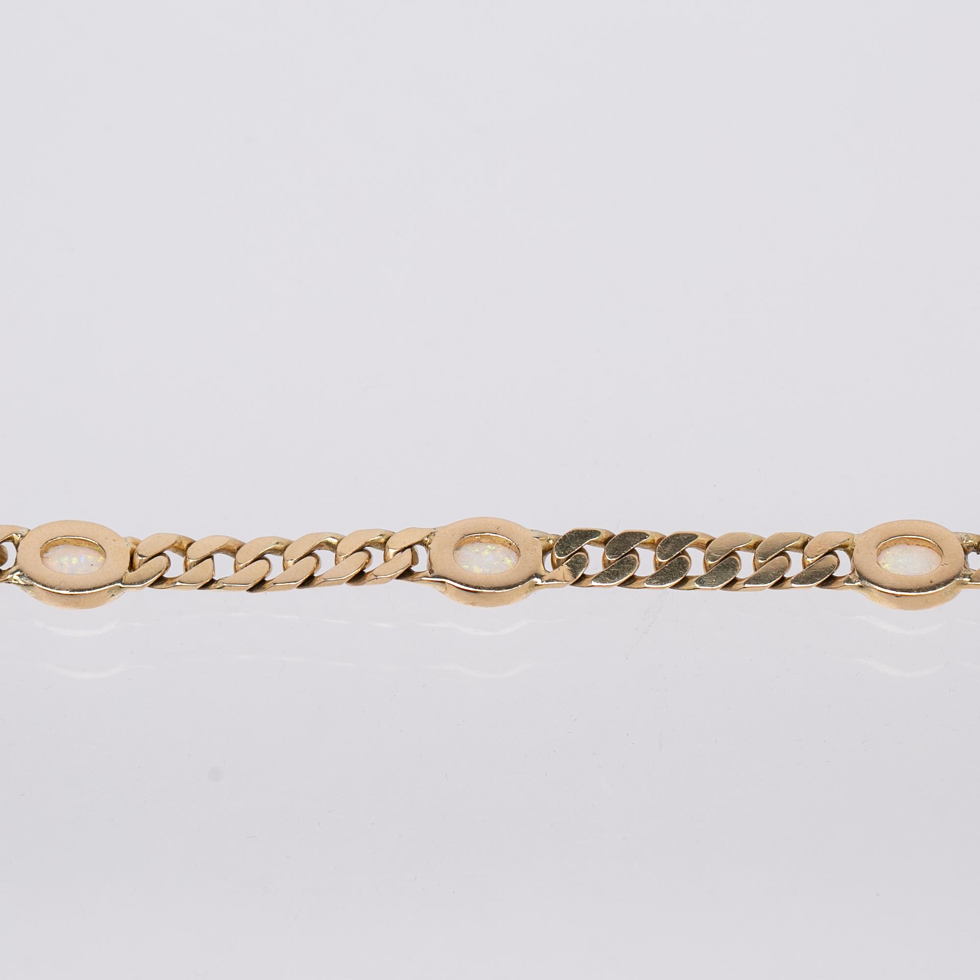 Bracelet, 14K gold with opals.