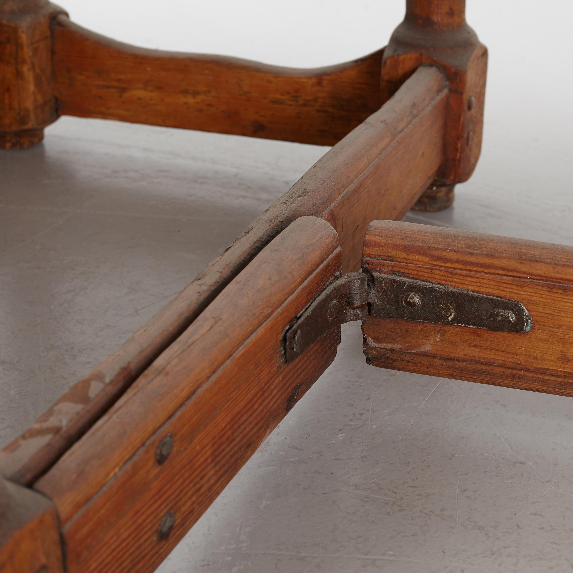 A drop-leaf table, 18th Century.