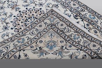 A rug, Nain, part silk, 238 x 163 cm.